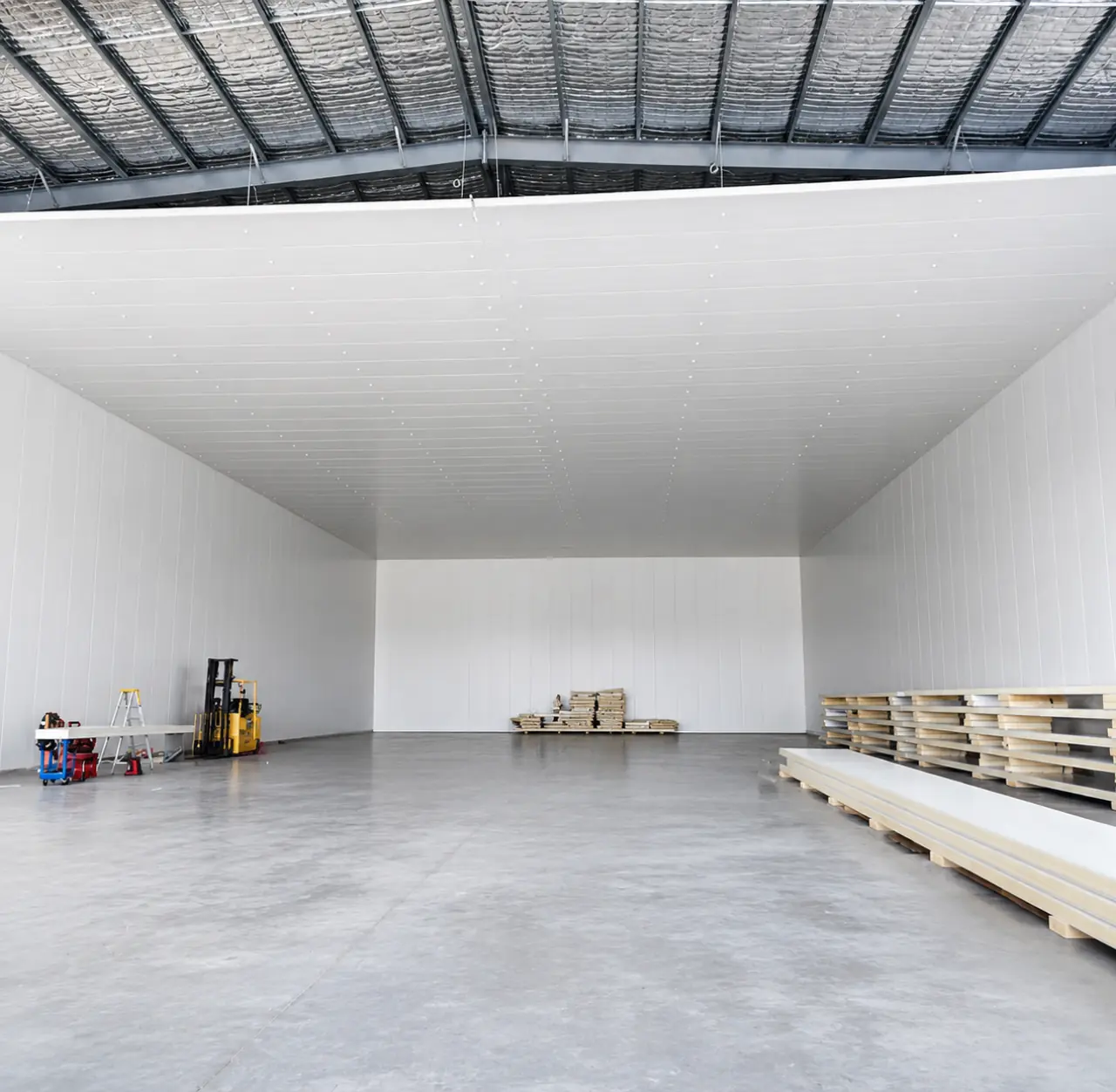 Industrial freezer room installation Melbourne — insulated panel walls and sliding freezer door